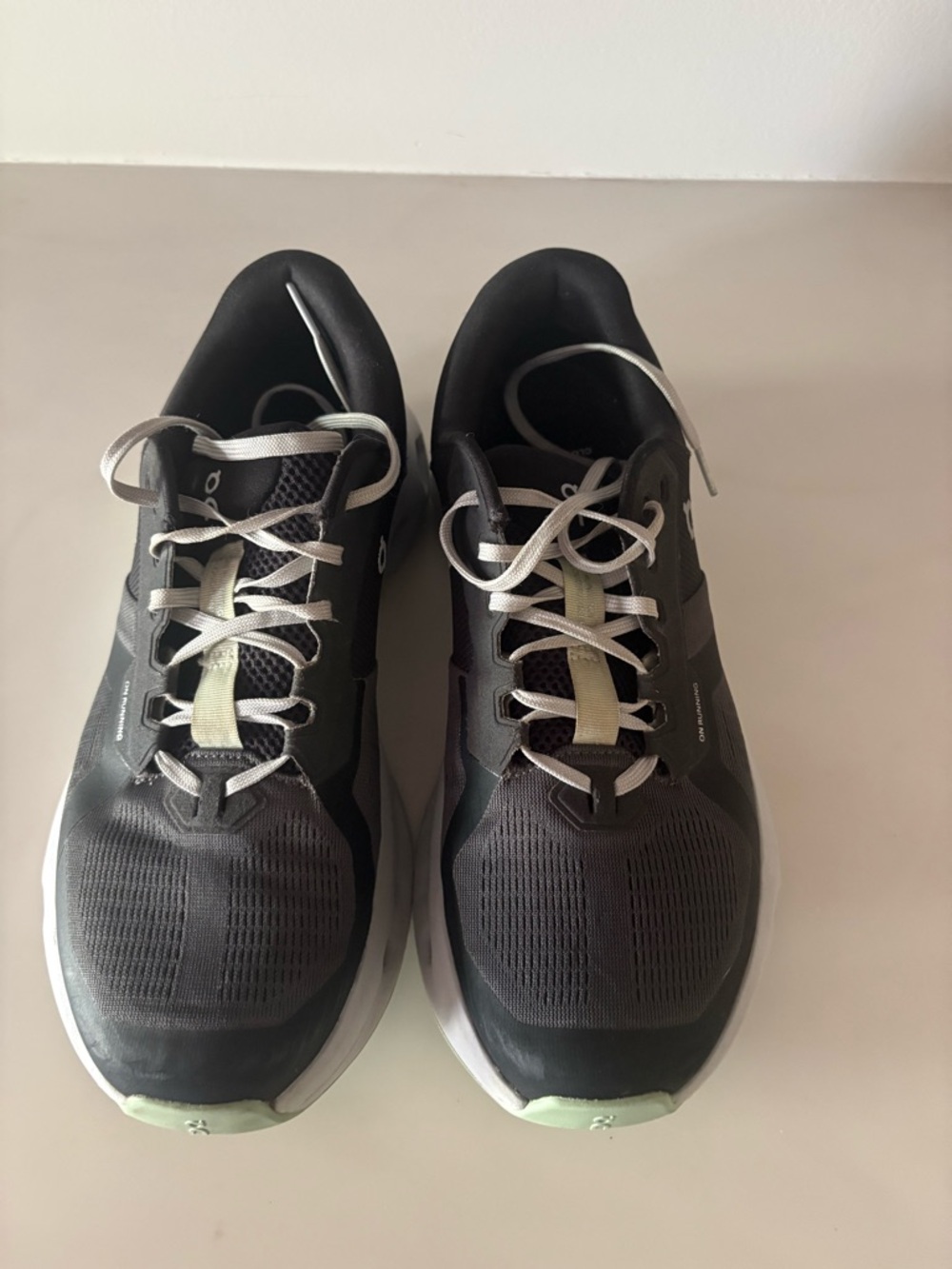 On Running Black and White Running Shoes with Light Green Detail